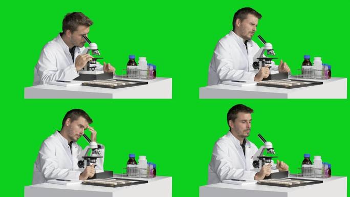 男性科学家担心和疲惫的显微镜