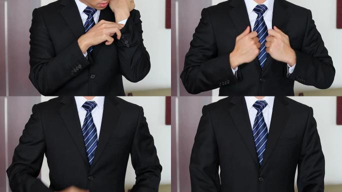 HD：调整西装和领带的商人。