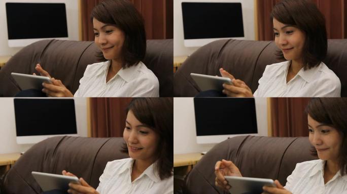 亚洲女人脸侧视图沙发侧视图平板电脑商店