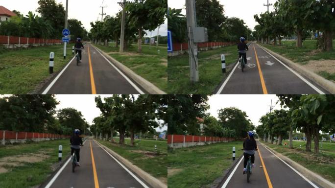 女子在自行车道上骑自行车