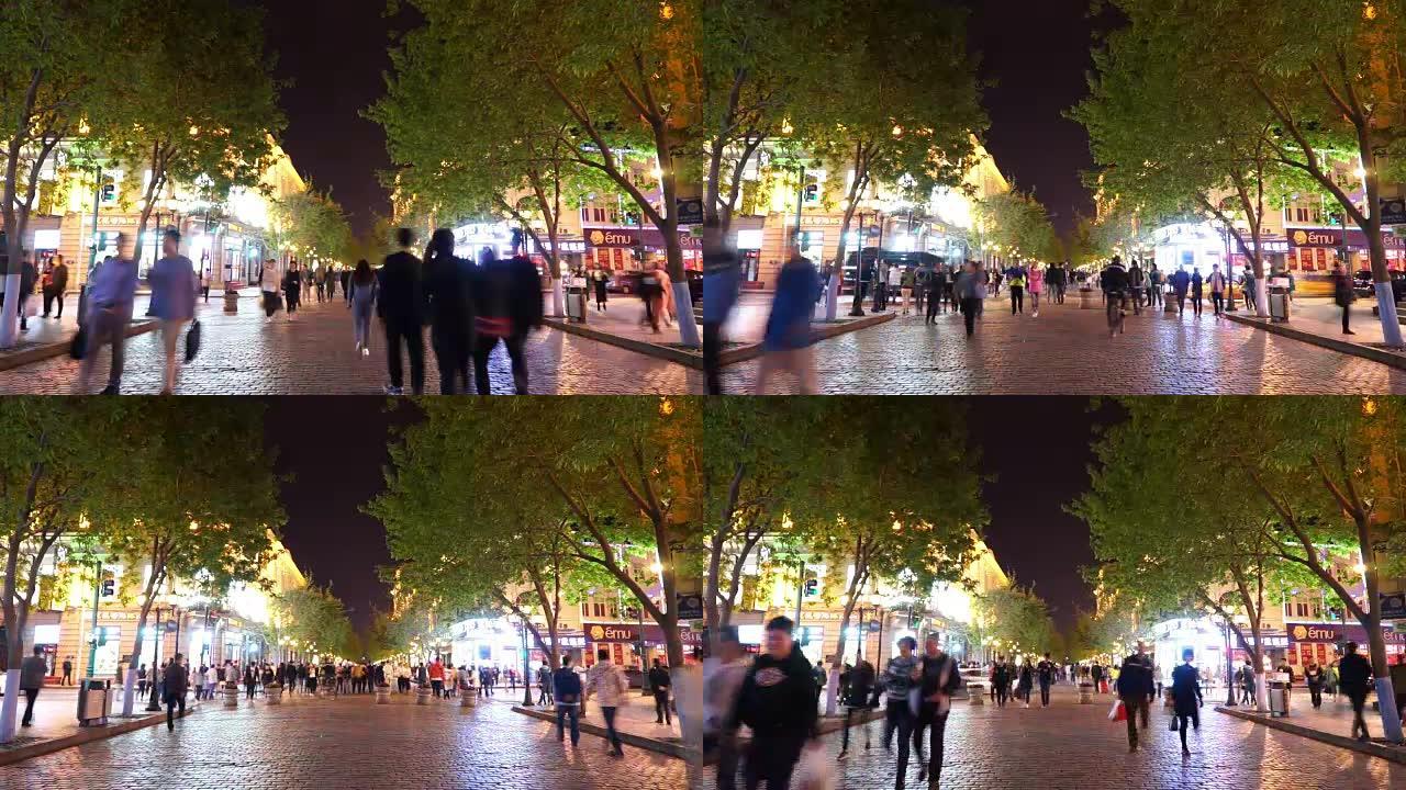 哈尔滨步行街上的拥挤人群在夜间延时