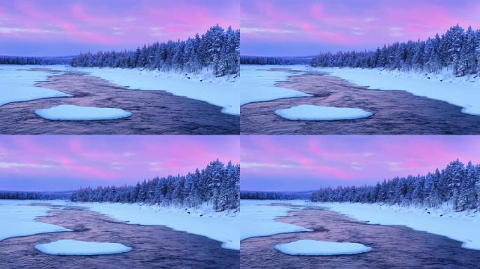 芬兰拉普兰，冬季风景中的河流急流日出