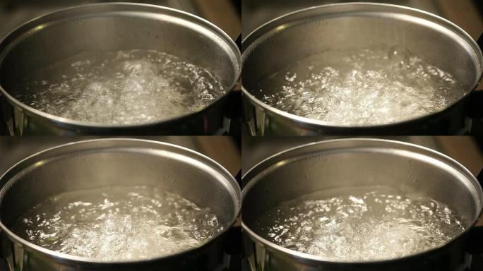沸水开水煮沸沸腾冒泡不锈钢锅盖特写