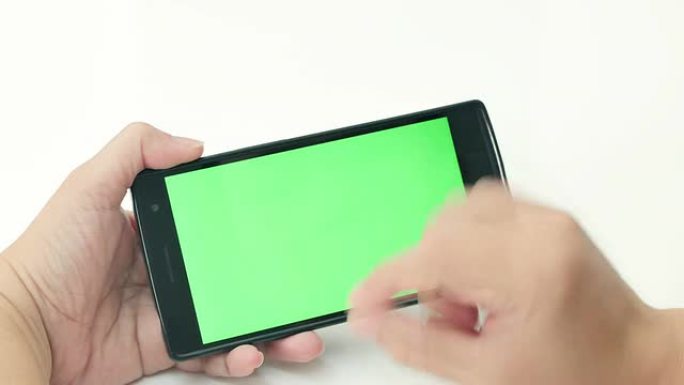 使用智能手机，绿屏的女性特写