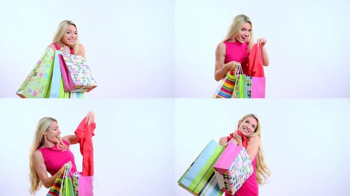 年轻漂亮的金发女人，带购物袋