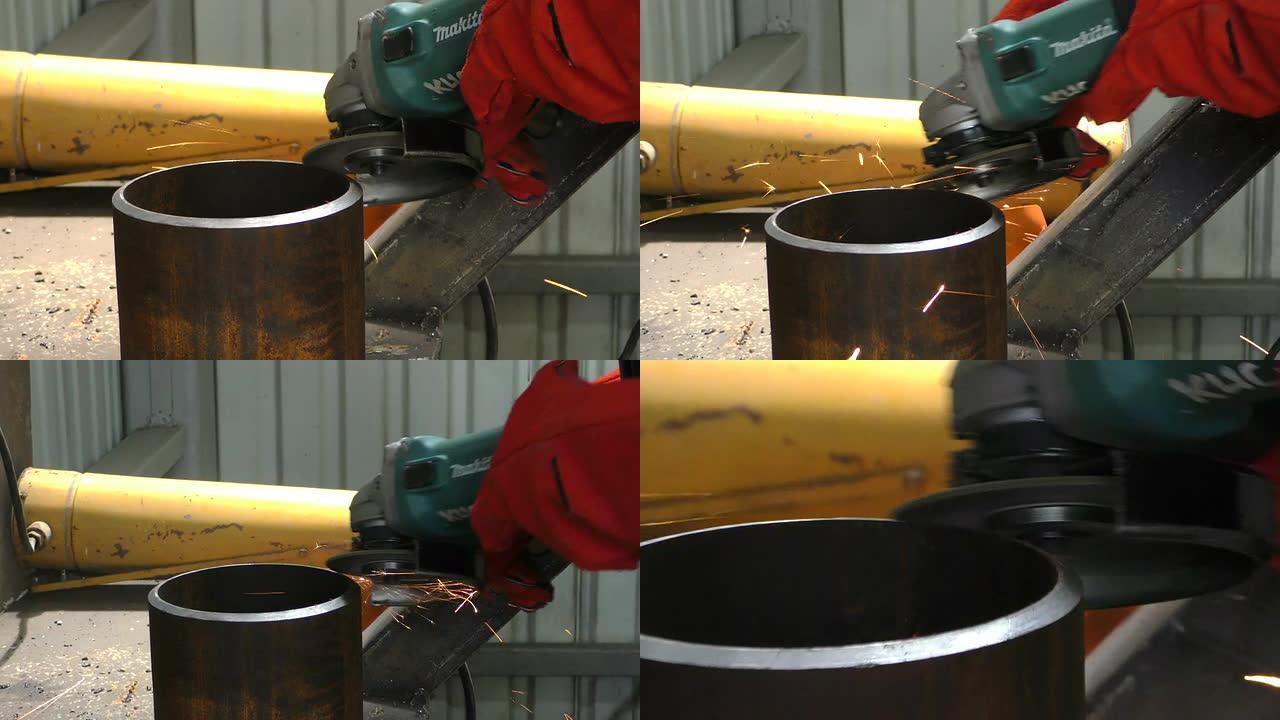 工人用研磨机切割金属的特写。