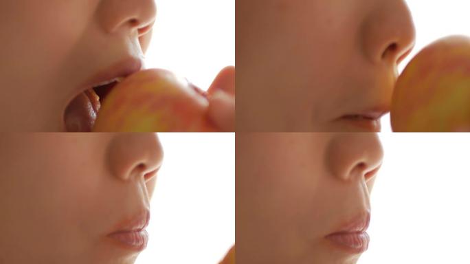 吃新鲜苹果的年轻女子的特写镜头，4k(UHD)