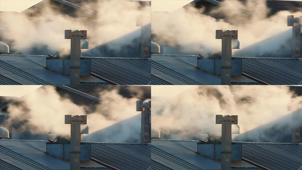 屋顶上烟囱冒出的蒸汽。