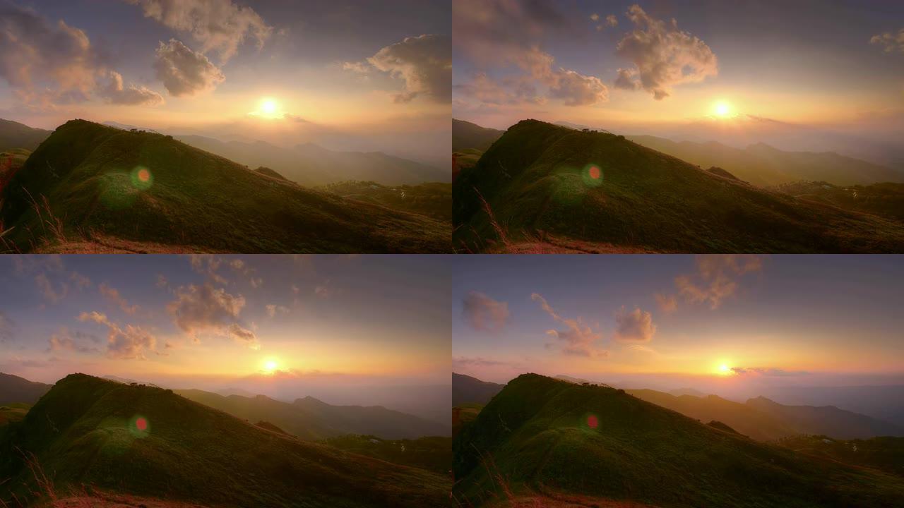 日落和云的运动在山上掠过