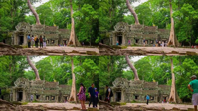 许多人参观柬埔寨吴哥塔普伦寺的变焦镜头