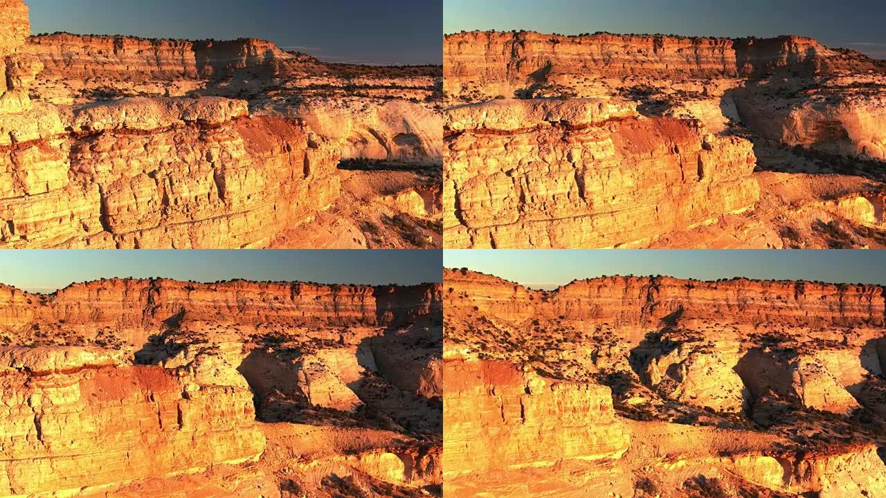 犹他州鹰峡谷上的金色日落之光-无人机拍摄
