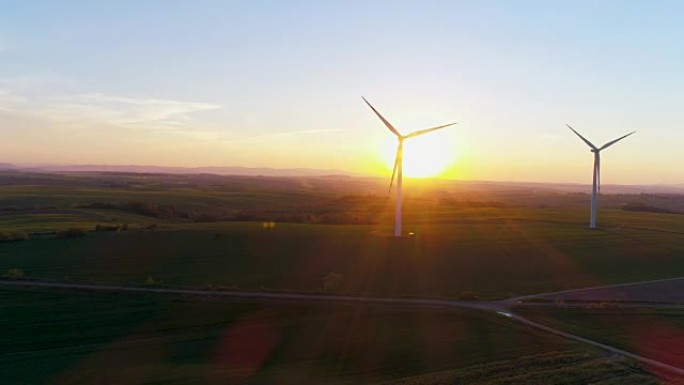 日落时的能源生产风车。