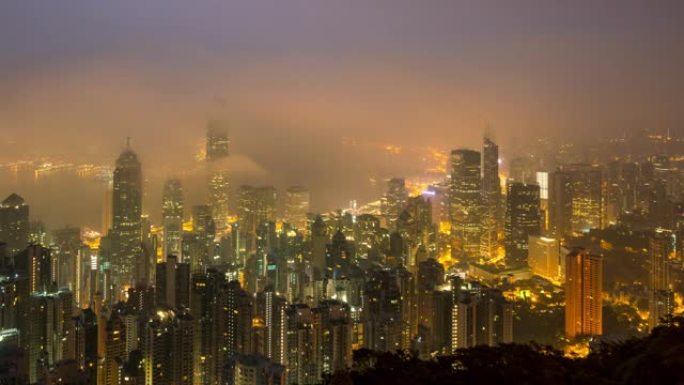日夜时间流逝香港城市天际线。从中国香港的太平山看