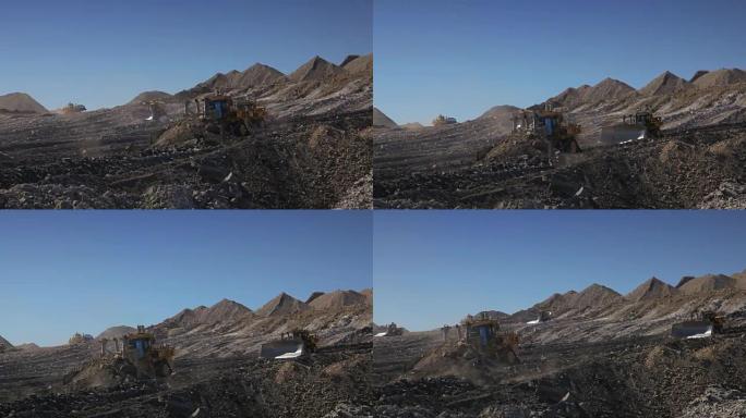 4台推土机在煤矿运土
