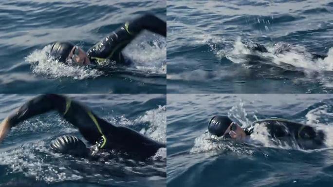 TS男游泳运动员在海上游泳前爬行