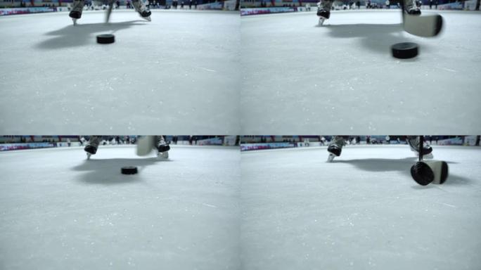 4k慢动作特写冰球运动员正在练习使用曲棍球棒运球。冰球溜冰场