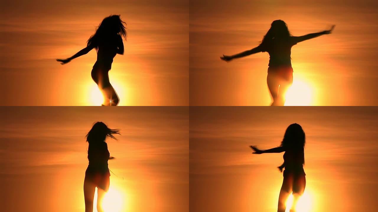 高清: 女人在日落时旋转