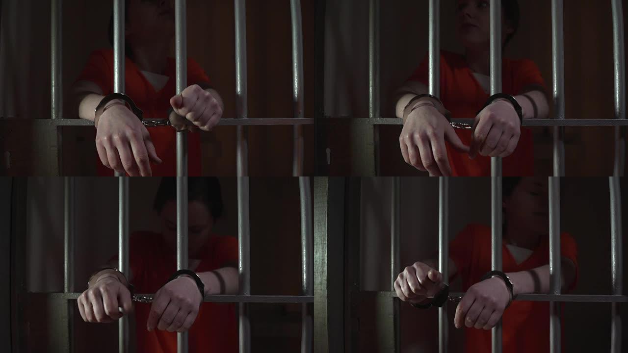 4K DOLLY: 戴着手铐的监狱牢房中的女性囚犯