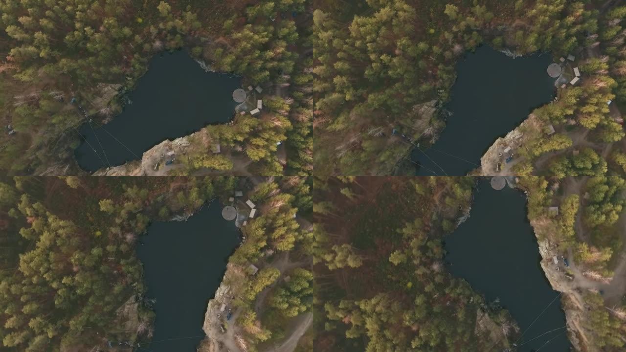 森林中央湖泊的俯视图。从无人机上射击。