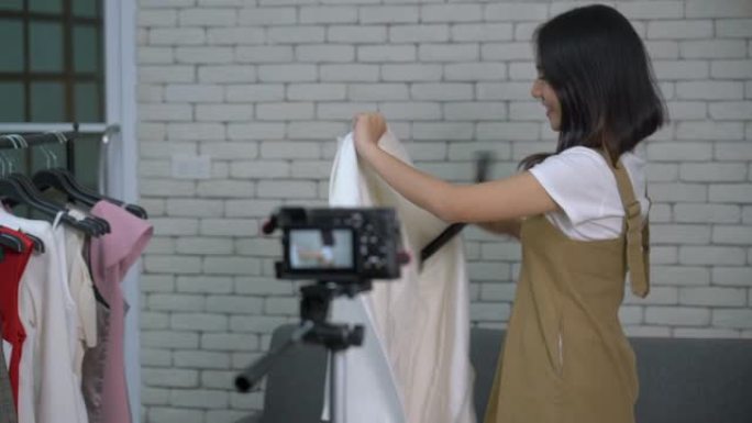 女性时尚视频记录器试穿衣服制作在线视频