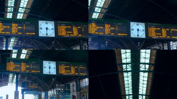 瓦伦西亚北站的白色时钟和电子列车时刻表
