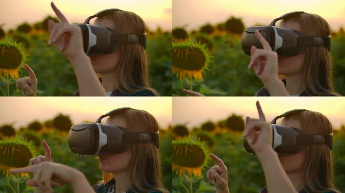 夏日黄昏，女农民经理在向日葵田里戴着VR眼镜