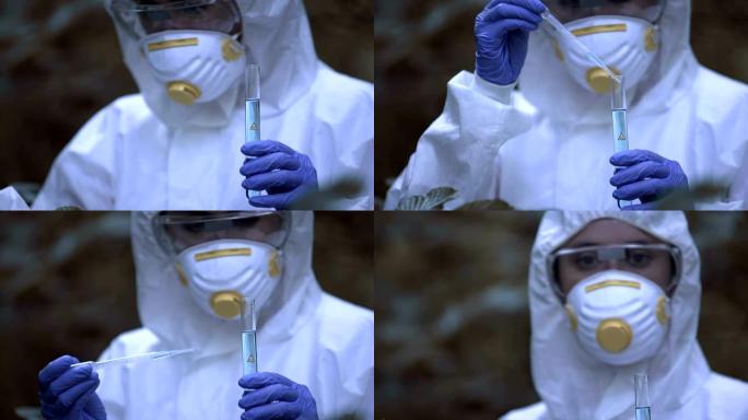 女生物学家检查受感染的水反应，受辐射影响的菌群