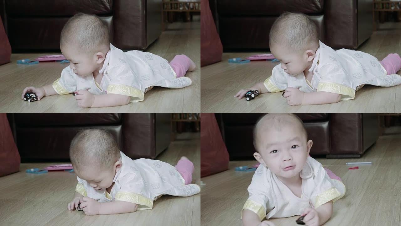 小男孩 (6-11个月) 在地板上嬉戏