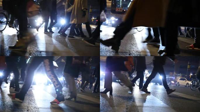 人们晚上走在街上