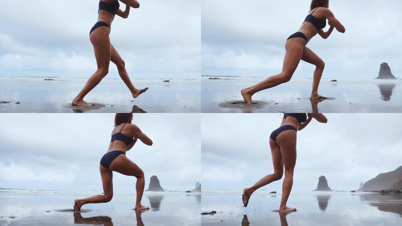 沿着海洋弯曲的双腿行走训练腿部肌肉的耐力，使大腿结实。海洋附近的女孩火车过着健康的生活方式