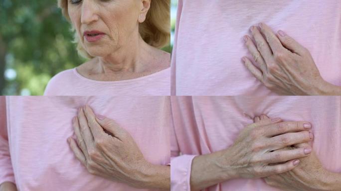 悲伤的女士手握胸部，进行性乳腺癌，不良诊断，疼痛