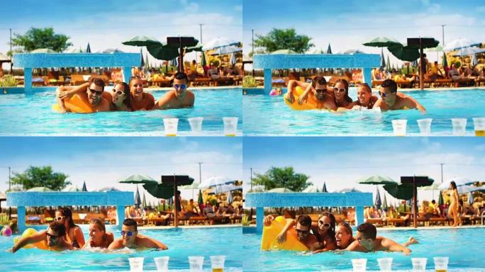 人们在游泳池里玩得开心