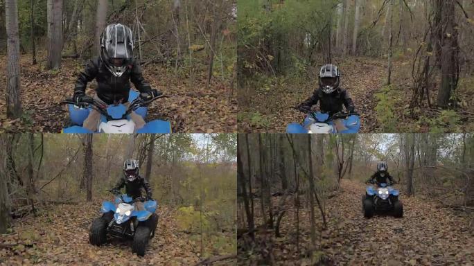 小男孩骑着ATV穿越森林