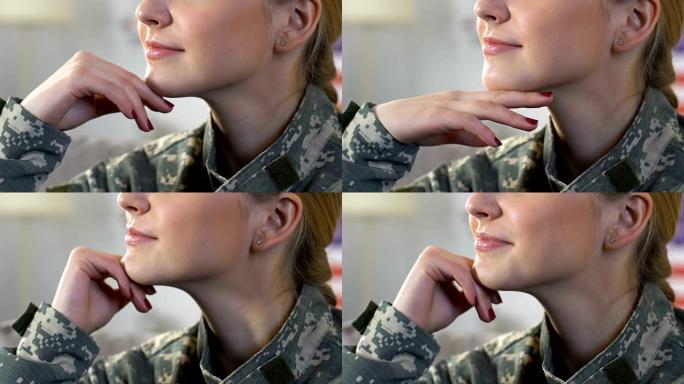 女兵迷彩服微笑特写，军人力量，爱国情怀