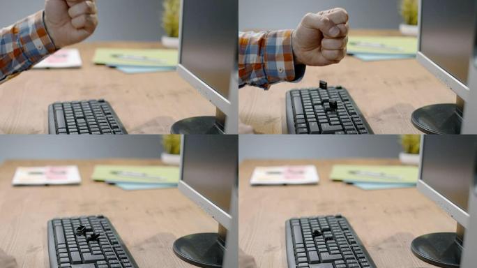 SLO MO男手用拳头敲击电脑键盘