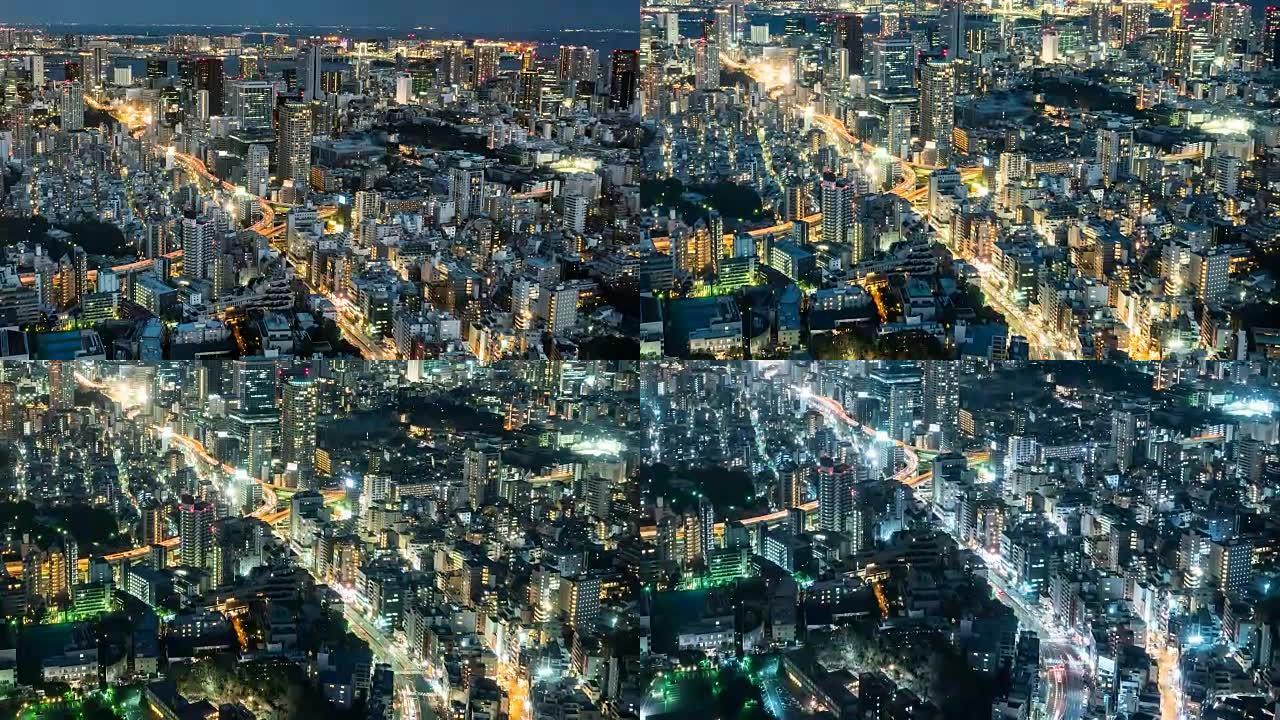 4K T/L向下倾斜: 东京之夜，在日本东京市的道路上有汽车往来。高角度视图