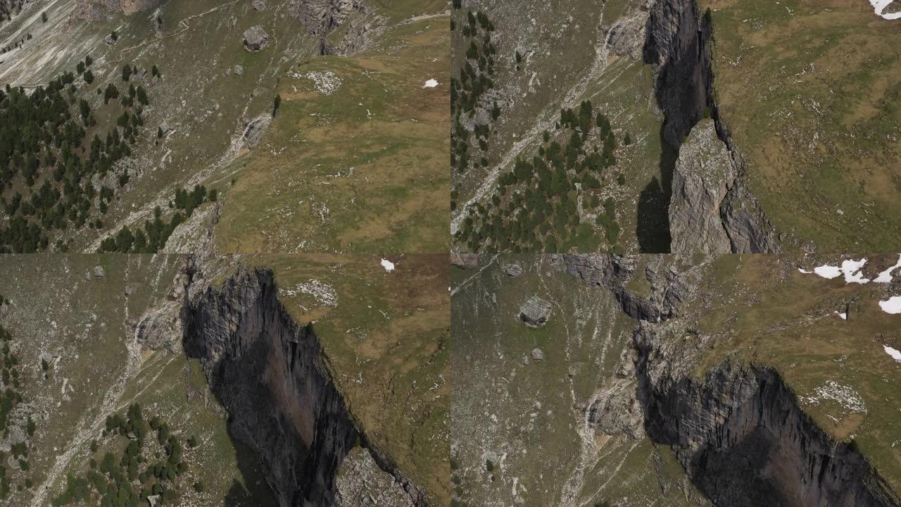 空中无人机在阿尔卑斯山的悬崖边拍摄