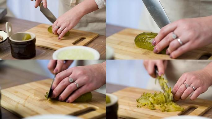 女人手切片切切碎绿色腌制酸黄瓜