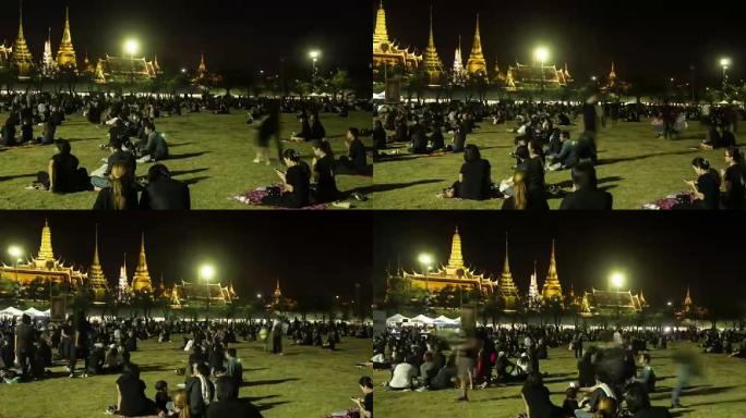 萨南銮 (Sanam Luang) 的一群哀悼者，而泰国普密蓬·阿杜德 (Bhumibol Adul