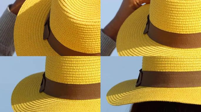 女人和黄帽子