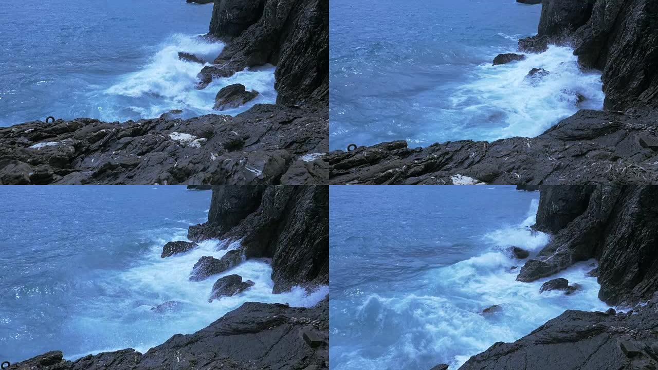 海浪在岩石海岸上飞溅