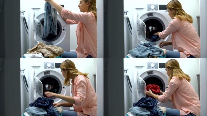女人从洗衣机里拿出衣服，洗衣服务，日常工作