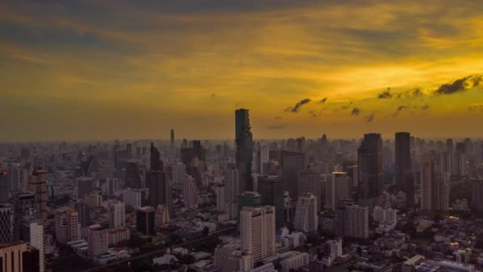 泰国曼谷市日出时带有摩天大楼的曼谷地标金融商务区的超快鸟瞰图