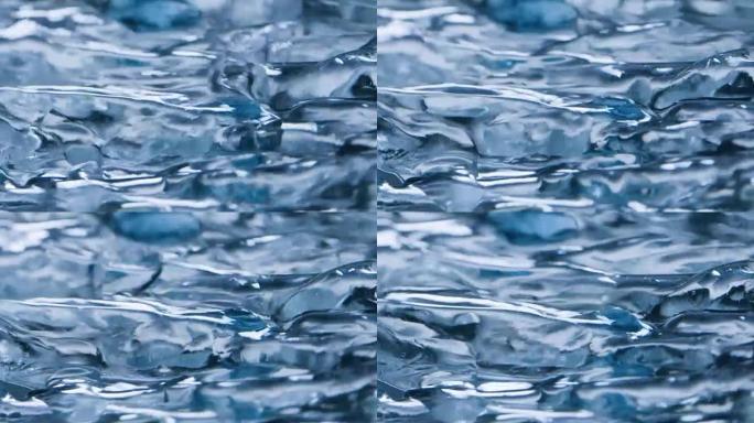 冻结表面的水流真实视频慢动作抽象背景