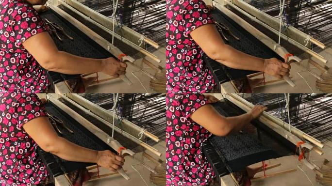 泰国Chaiyaphum的泰国妇女在家里编织。