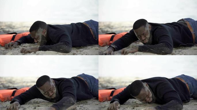 陷入困境的难民躺在海滩上，恳求寻求帮助，坠机幸存者