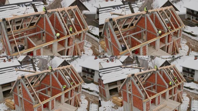 空中建造者为房屋的屋顶架起木梁