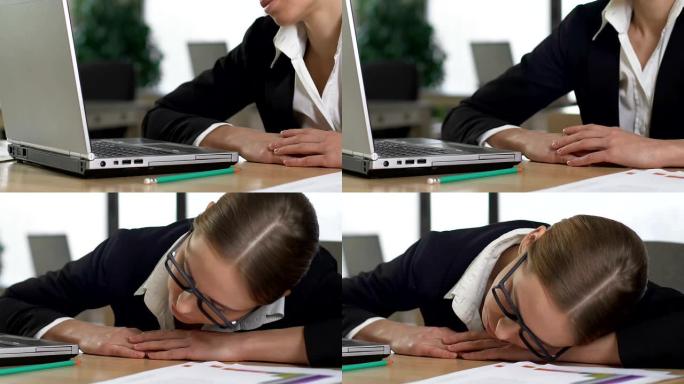 疲惫的员工睡在桌子上，过度劳累，任务乏力
