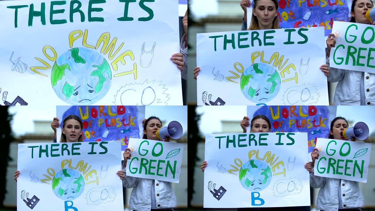 志愿者高喊口号绿色，反对森林砍伐，空气污染