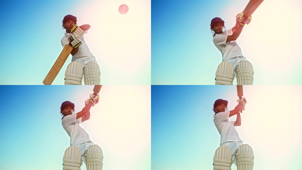 SLO MO男板球运动员身穿护具在阳光下击球
